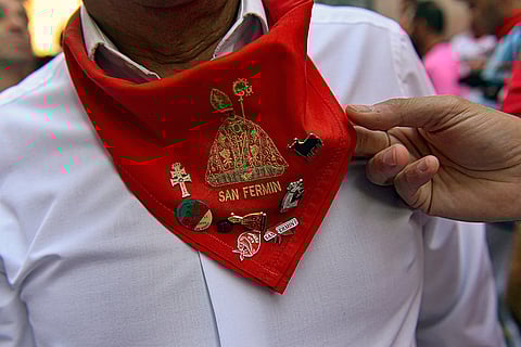 A reveller with San Fermin neck scarf